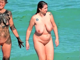 Shameless amateur fisted on a public beach