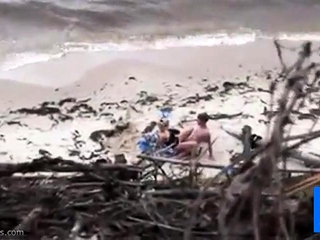 Couple fucking on the beach
