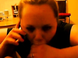 Cheating Girl on Phone With Husband While Sucking a BBC