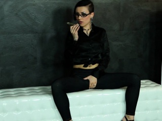 Euro spex babe toys her pussy at gloryhole