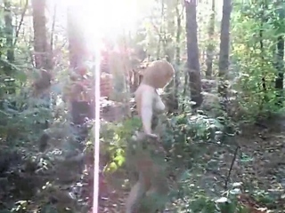 Redhead Amateur Shows Off Her Big Booty in the Forest